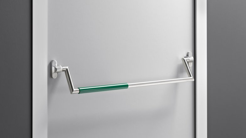 Panic bar made of matt polished stainless steel with green polyamide handle tube